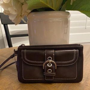 Wallet by Coach. Brown Leather.